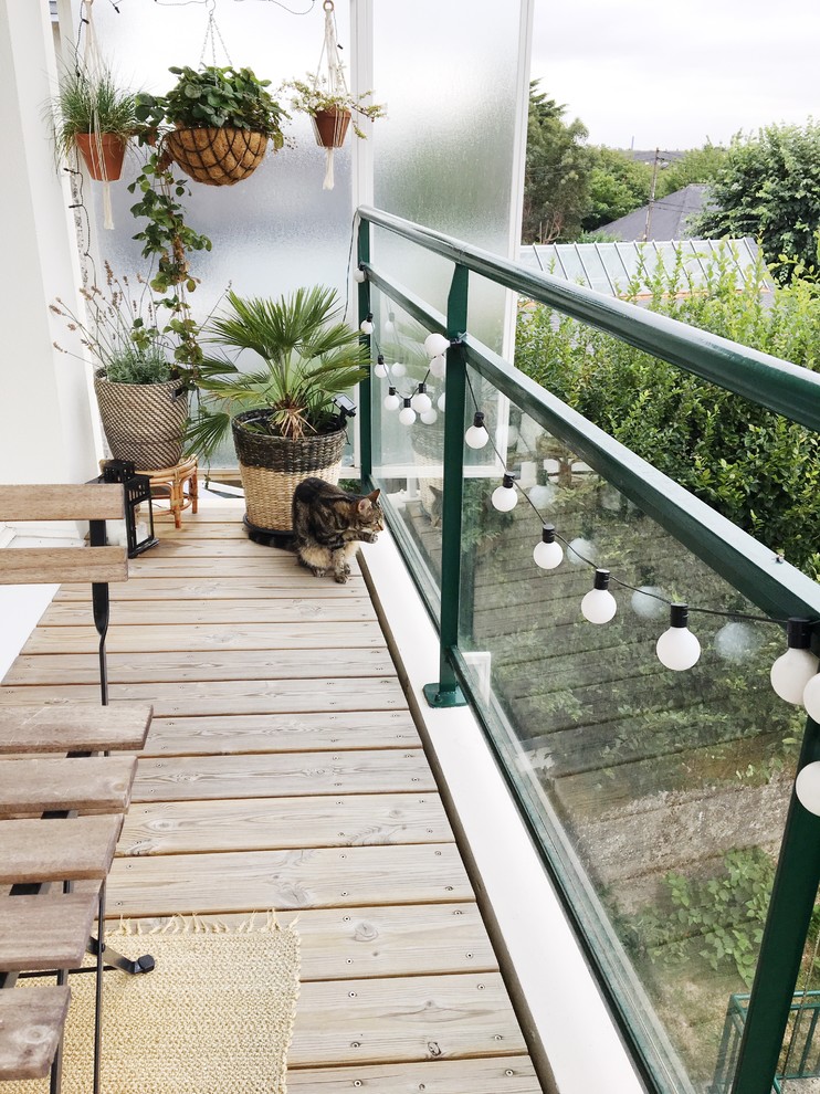 Inspiration pour un balcon nordique avec des plantes en pot.