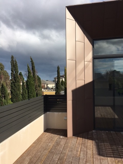 This is an example of a large contemporary balcony in Melbourne with no cover.