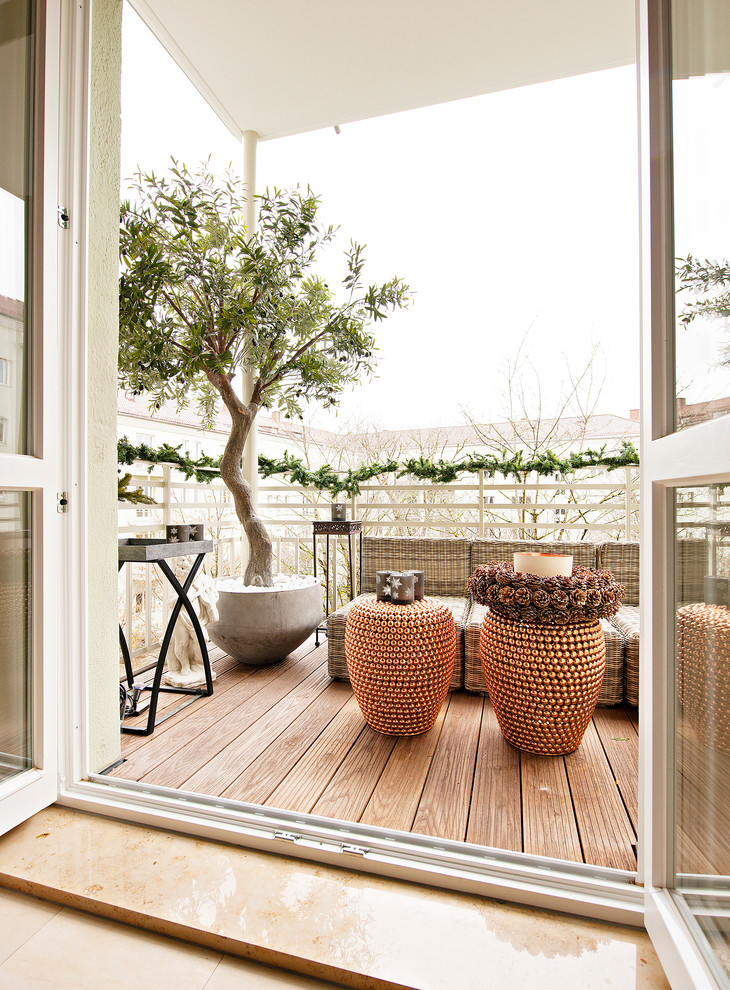 Idéer för att renovera en mellanstor minimalistisk balkong, med takförlängning