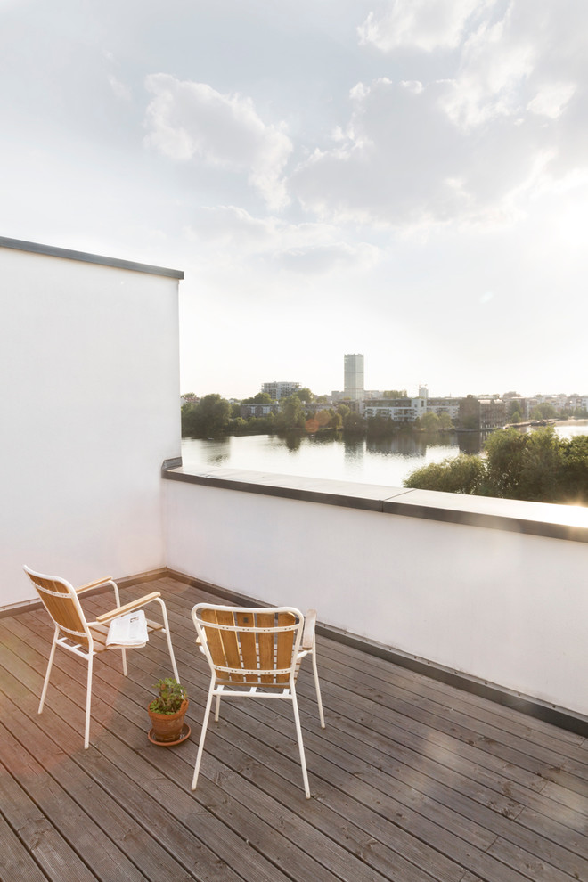 Medium sized balcony in Berlin with no cover.