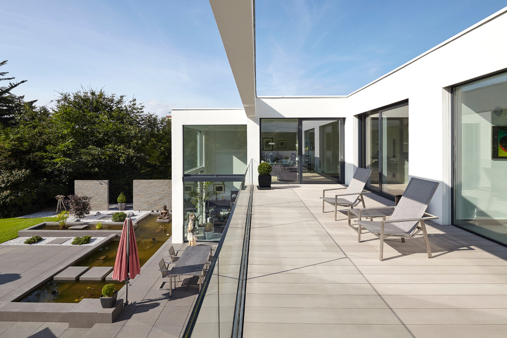 Свежая идея для дизайна: балкон и лоджия в стиле модернизм без защиты от солнца - отличное фото интерьера