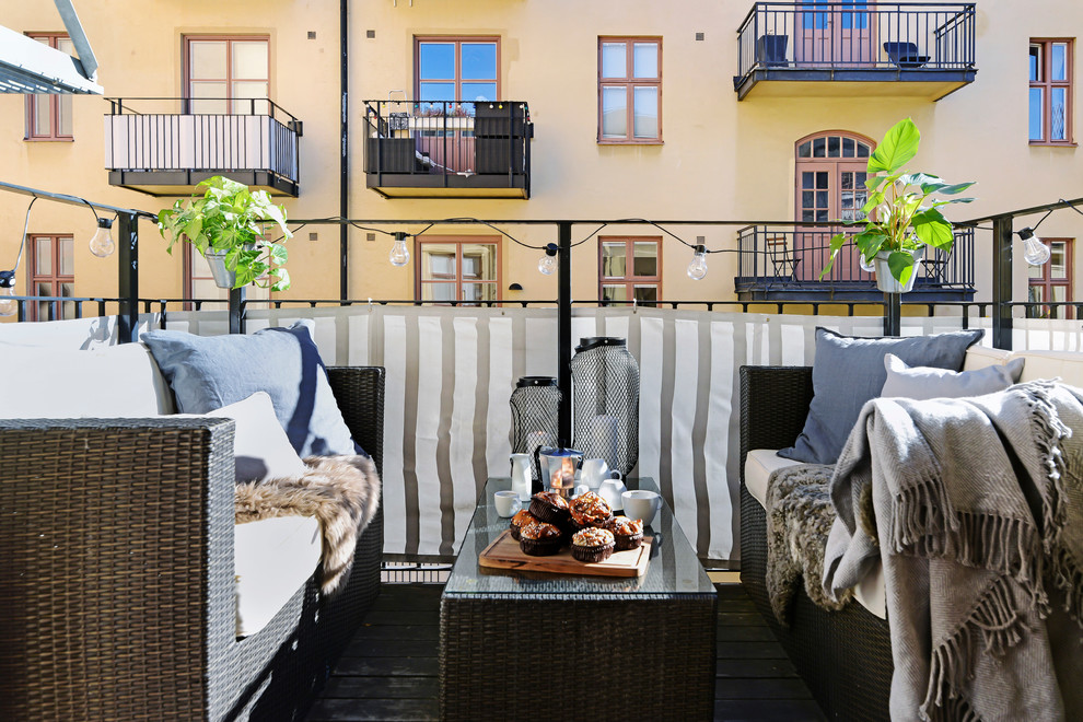 Inspiration for a scandinavian balcony remodel in Stockholm