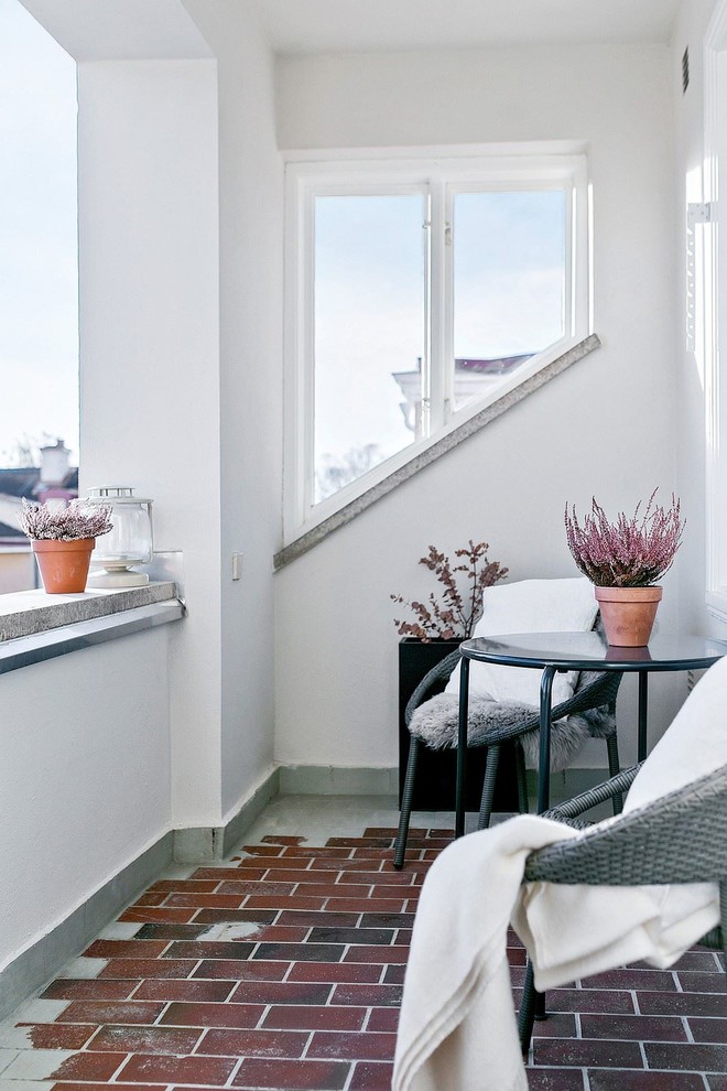 Photo of a large scandi balcony in Stockholm with no cover.