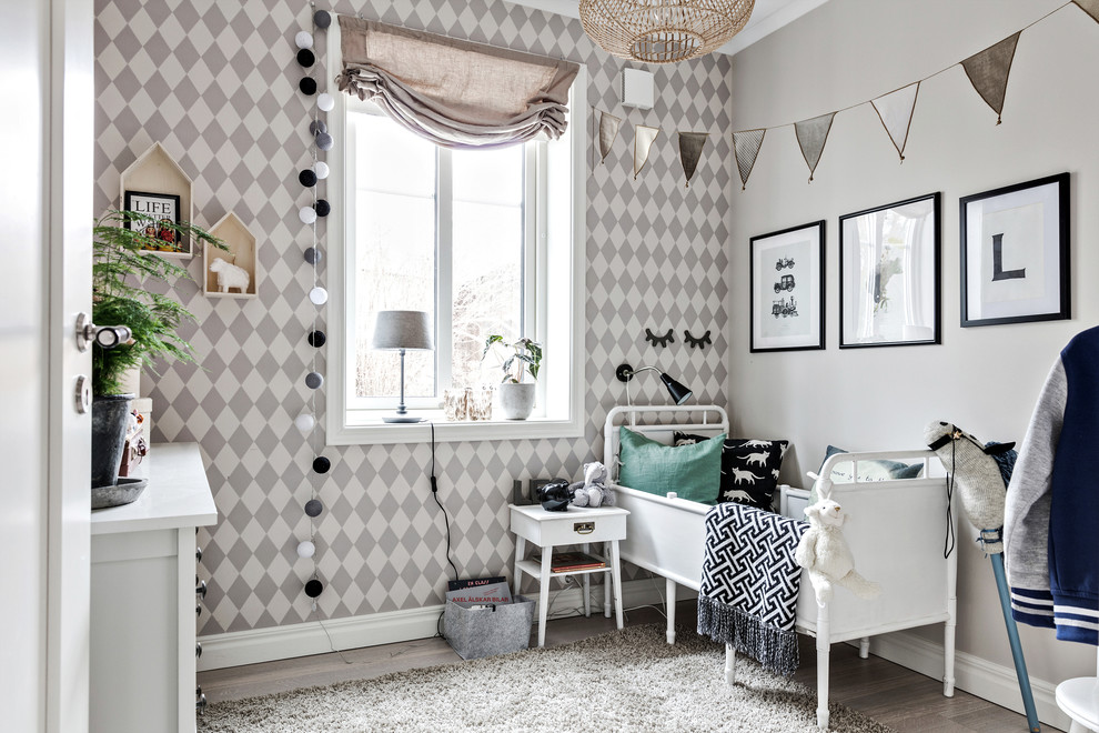 Kids' room - small scandinavian gender-neutral kids' room idea in Gothenburg with multicolored walls