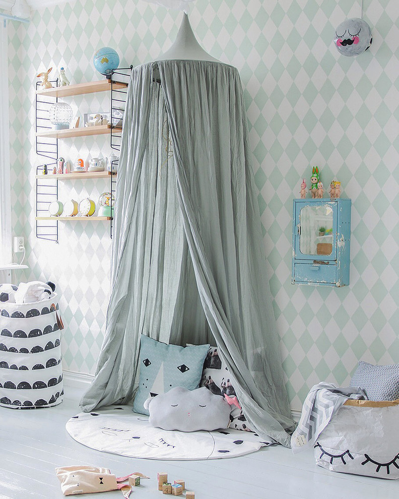 Design ideas for a medium sized scandi gender neutral kids' bedroom in Other with painted wood flooring and multi-coloured walls.