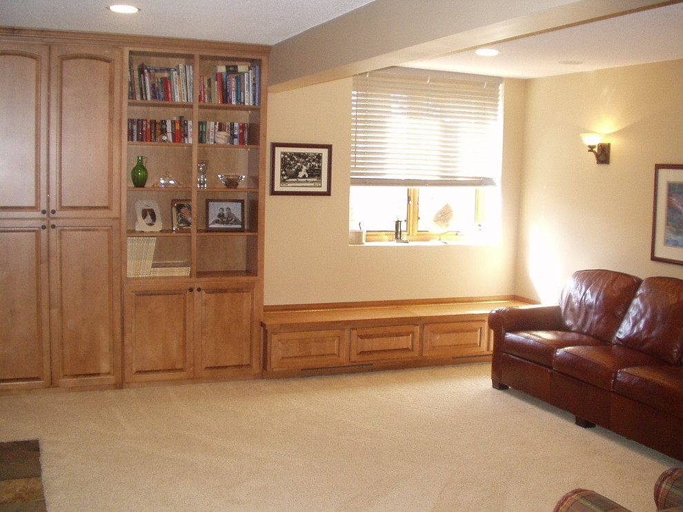 Elegant carpeted and white floor basement photo in Minneapolis with beige walls, a standard fireplace and a tile fireplace