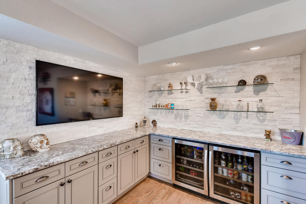Inspiration for an expansive classic home bar in Denver with carpet and multi-coloured floors.