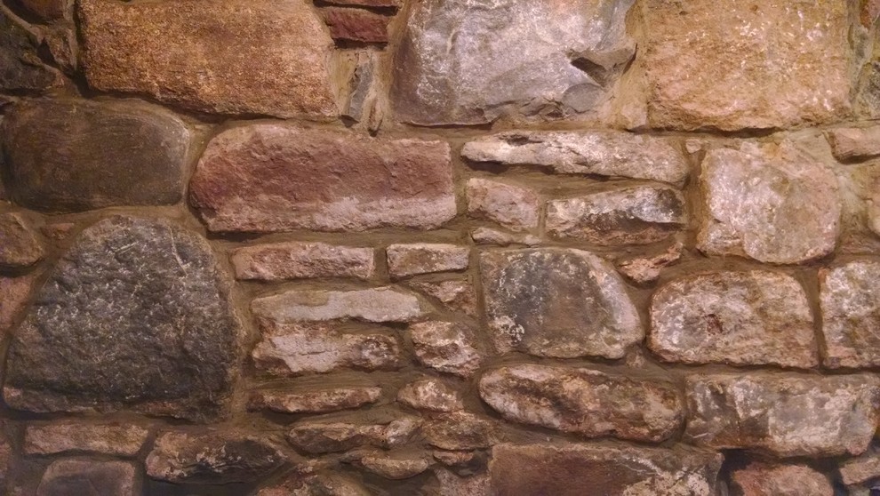 1890 Basement Rock foundation wall repointed Rustic Basement New