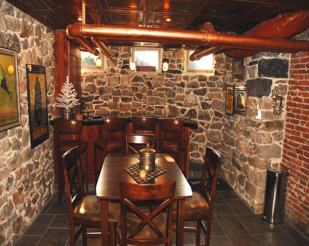 Photo of a victorian basement in Philadelphia with grey floors.