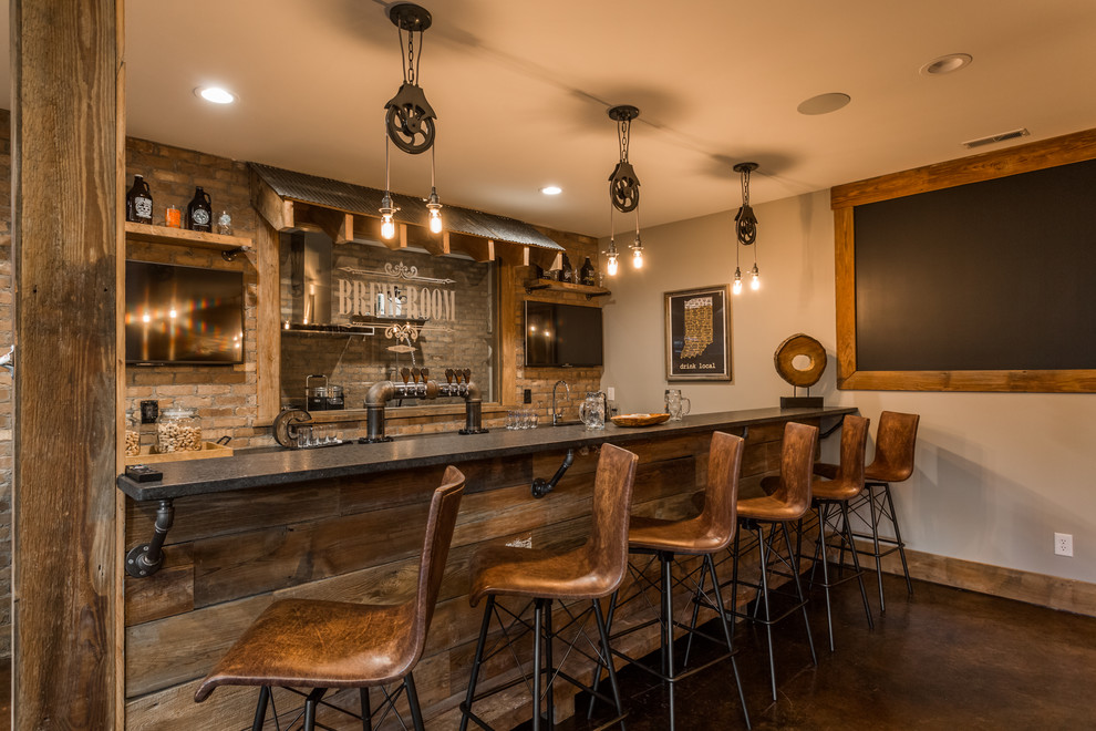 Design ideas for a medium sized rustic fully buried basement in Indianapolis with beige walls, dark hardwood flooring, no fireplace, brown floors and a home bar.