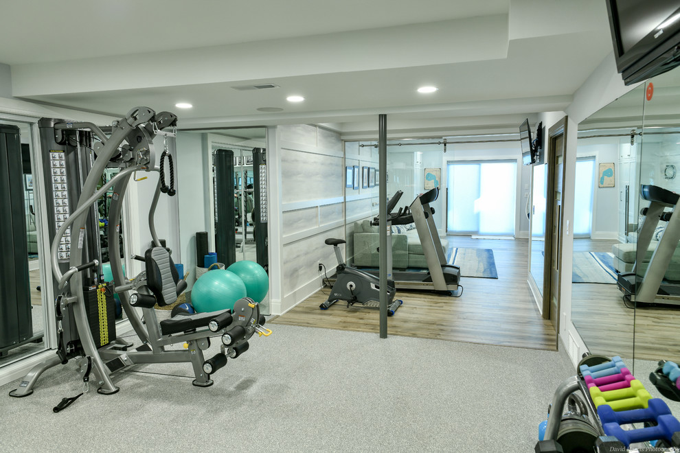 Photo of a contemporary home gym in Cleveland.