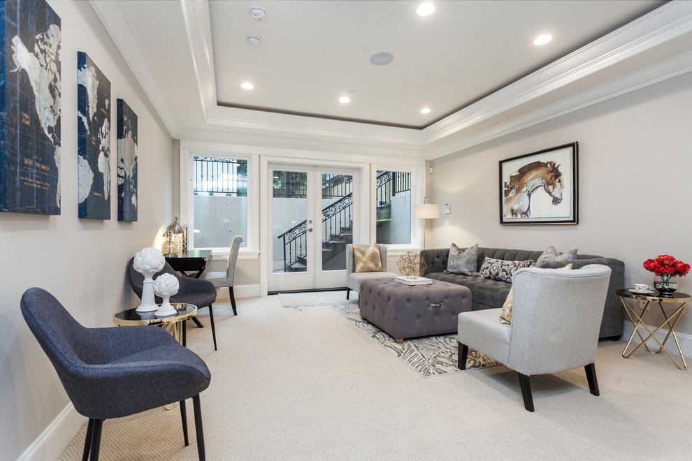 This is an example of a large traditional walk-out basement in Vancouver with grey walls, carpet, no fireplace and white floors.
