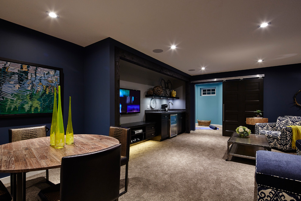Large trendy carpeted basement photo in Other with blue walls and no fireplace