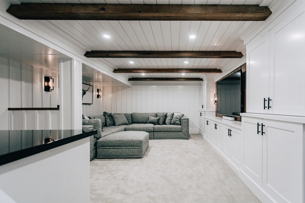 Inspiration for a medium sized country fully buried basement in Minneapolis with a home bar, white walls, carpet, grey floors, a wood ceiling and panelled walls.
