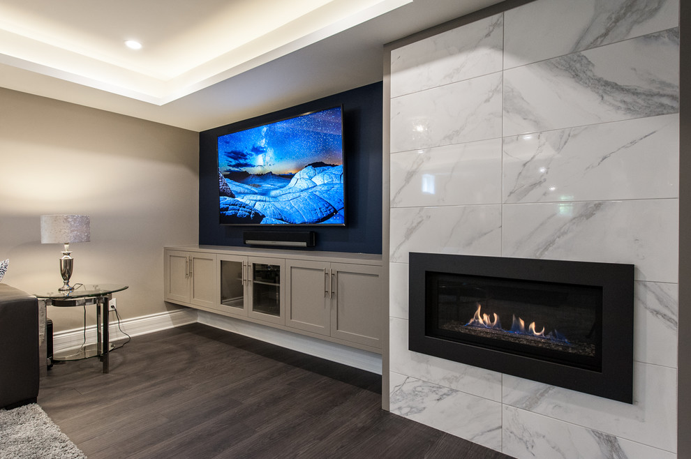 Mid-sized transitional look-out basement photo in Ottawa with a tile fireplace