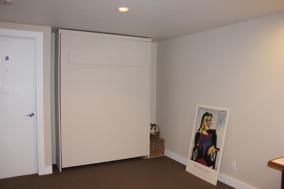 Example of a minimalist basement design in Calgary