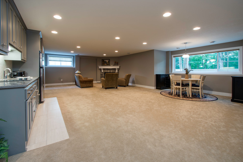 Design ideas for a large classic look-out basement in Minneapolis with brown walls and carpet.