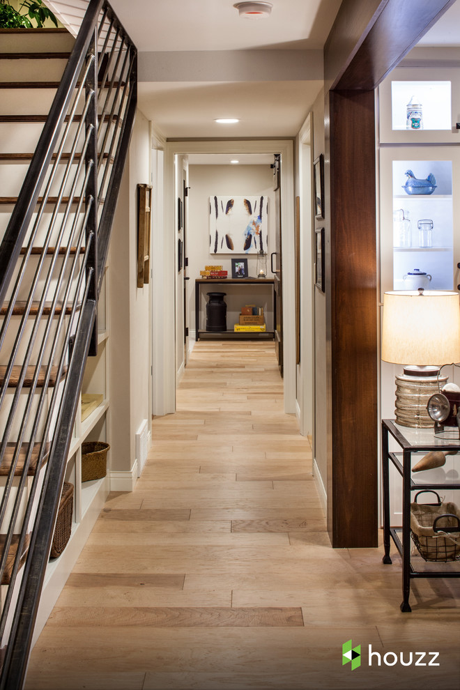 Hallway - traditional medium tone wood floor hallway idea in Other with beige walls