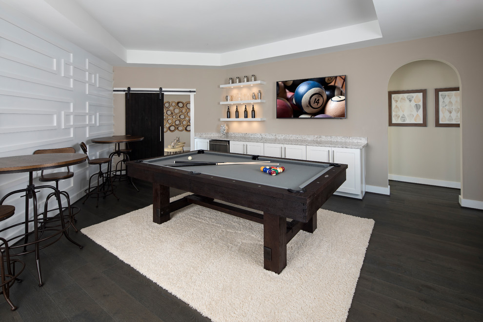 Design ideas for a classic games room in Austin with beige walls and dark hardwood flooring.