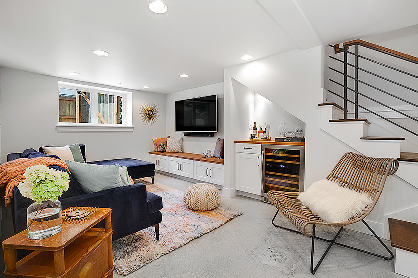 Inspiration for a transitional look-out basement remodel in Seattle with white walls and no fireplace