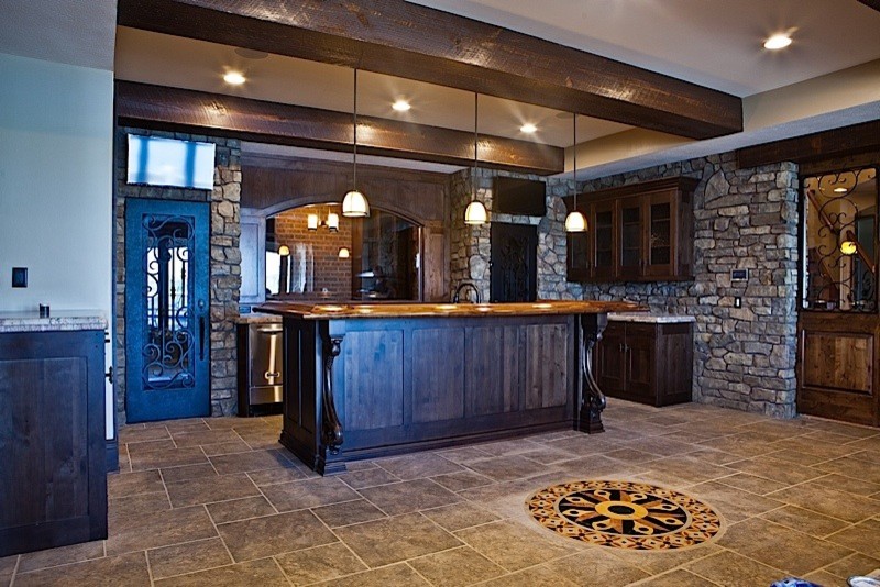Example of a large trendy underground ceramic tile basement design in Omaha with beige walls and no fireplace