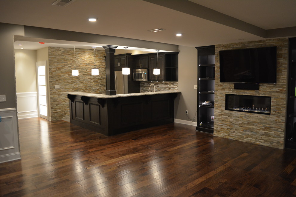 This is an example of a classic basement in Philadelphia with brown floors.