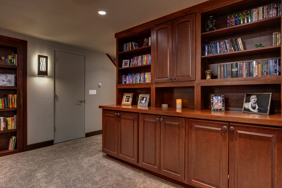 Example of a large transitional carpeted and brown floor basement design in Denver with beige walls and no fireplace