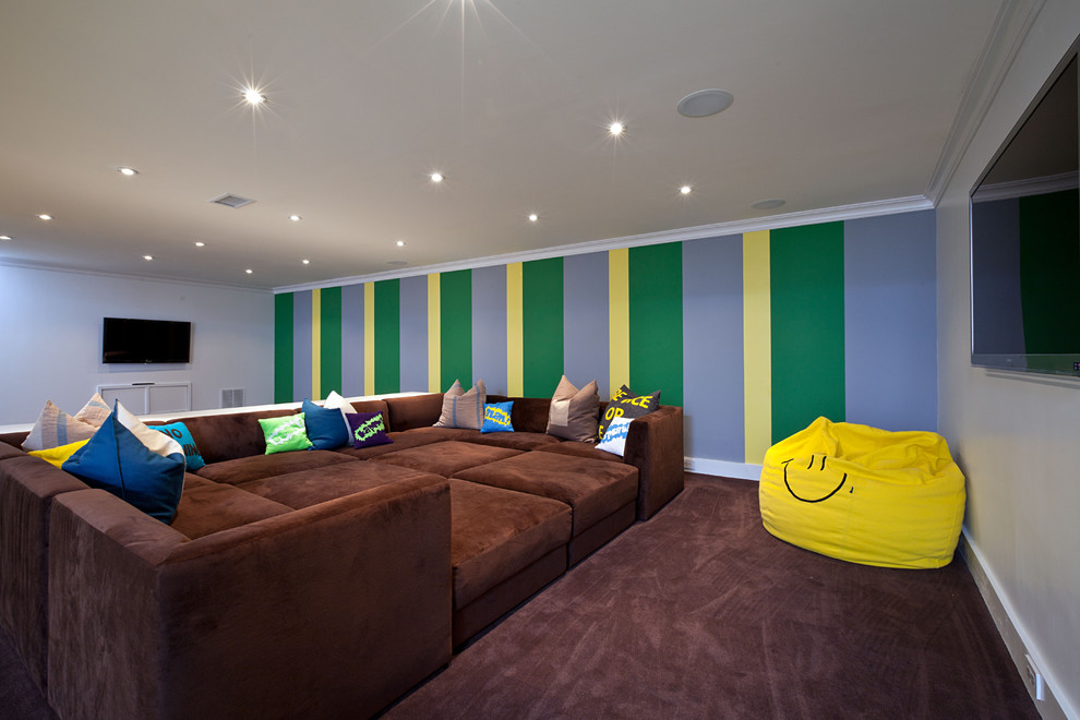 Trendy carpeted basement photo in New York with multicolored walls
