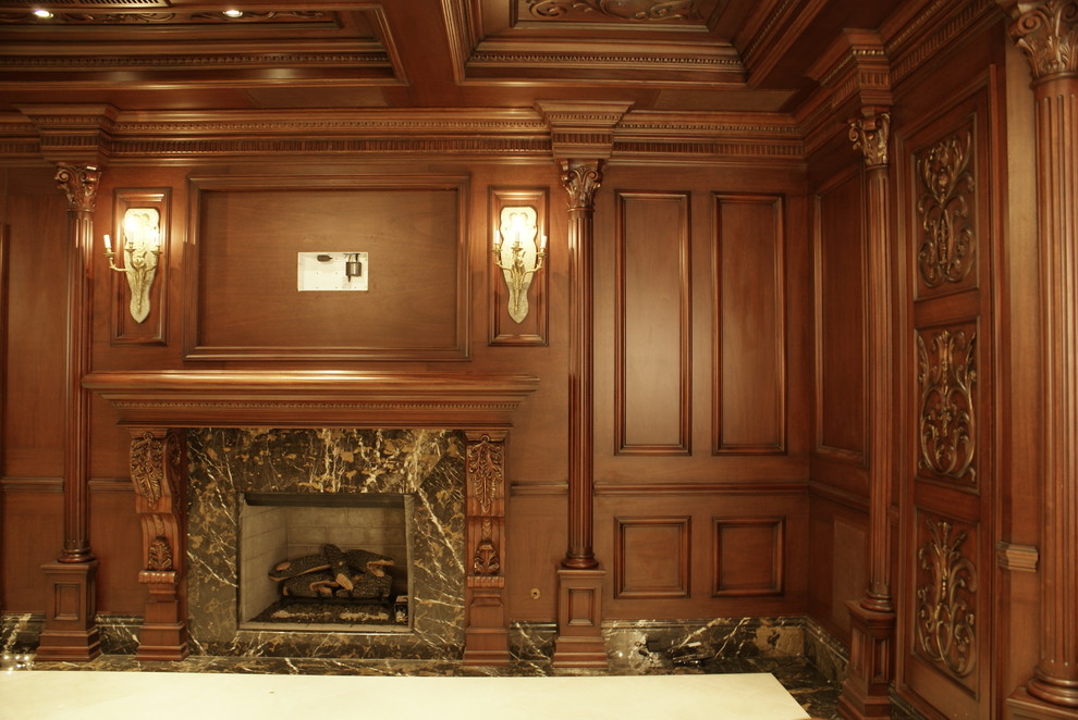 Example of a large classic underground porcelain tile and white floor basement design in New York with brown walls, a standard fireplace and a stone fireplace