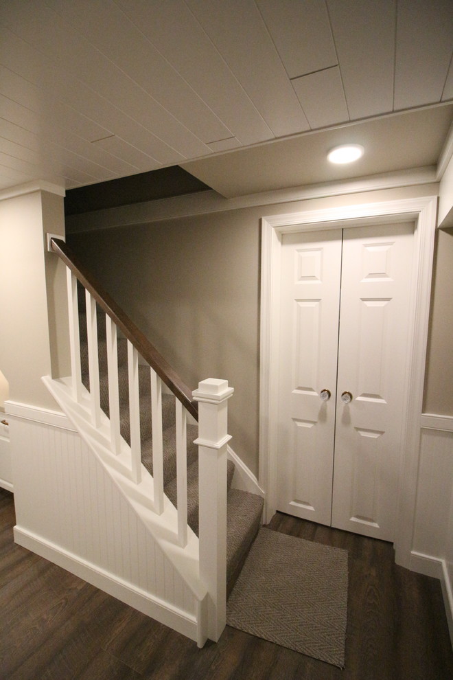 Photo of a small classic fully buried basement in Other with beige walls, cork flooring, no fireplace and brown floors.