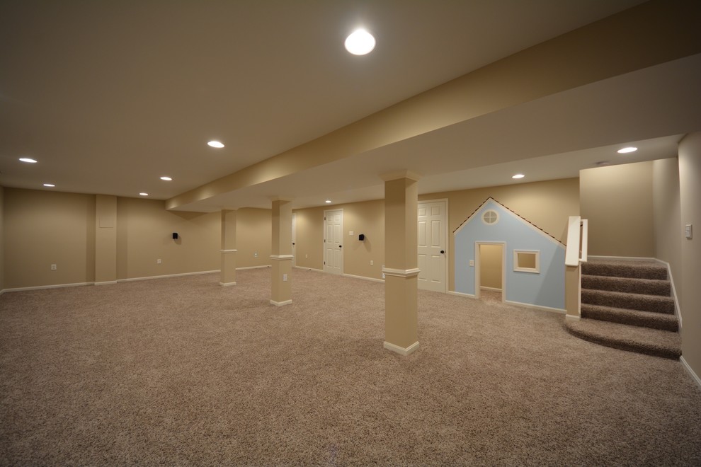 Mid-sized transitional underground carpeted basement photo in DC Metro with beige walls and no fireplace