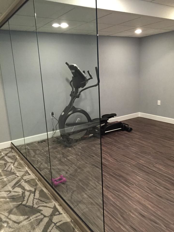 Basement gym with luxury vinyl tile - Home Gym - New York - by Grade A ...