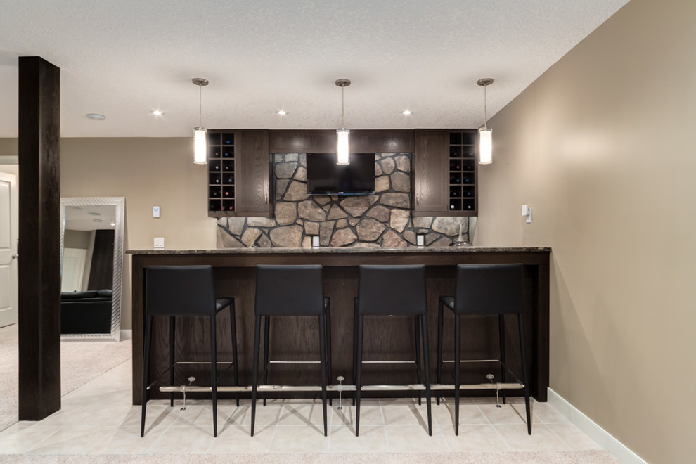 Inspiration for a medium sized contemporary fully buried basement in Calgary with beige walls and carpet.