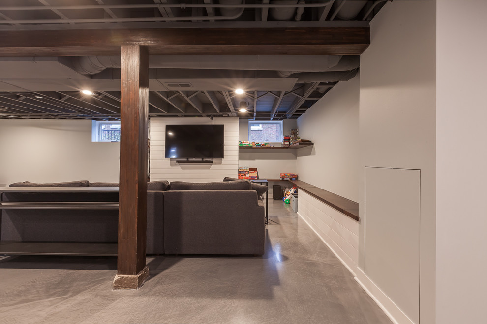 Medium sized modern look-out basement in Chicago with grey walls, concrete flooring, no fireplace and blue floors.