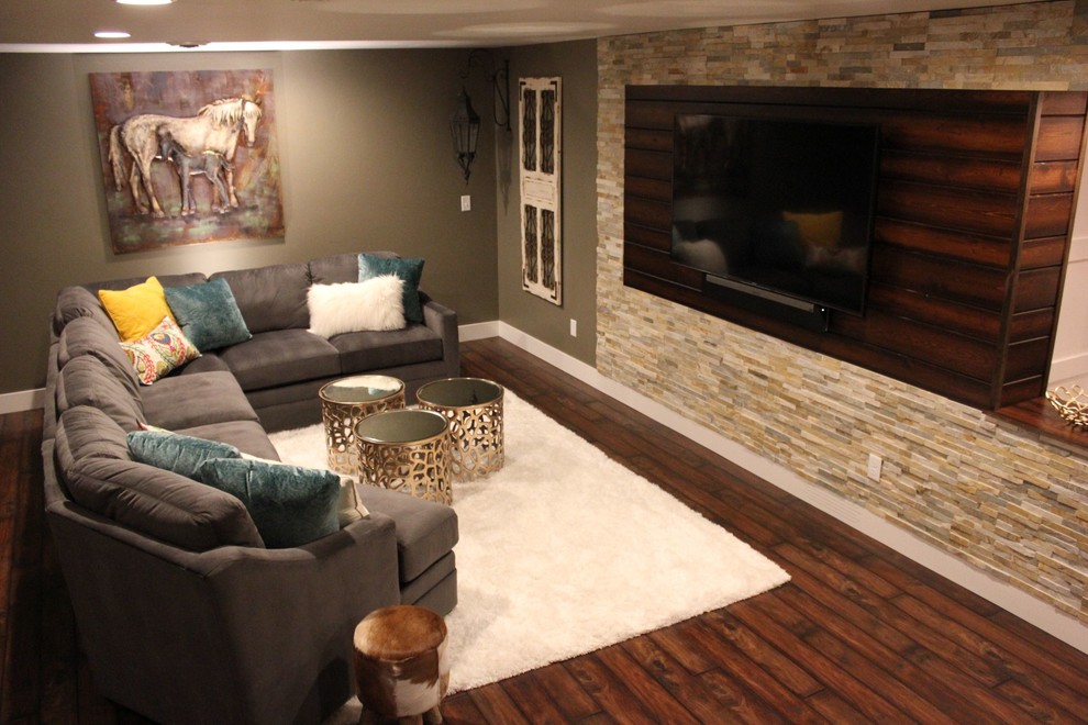 Design ideas for a large rustic fully buried basement in Other with grey walls, dark hardwood flooring, no fireplace and brown floors.
