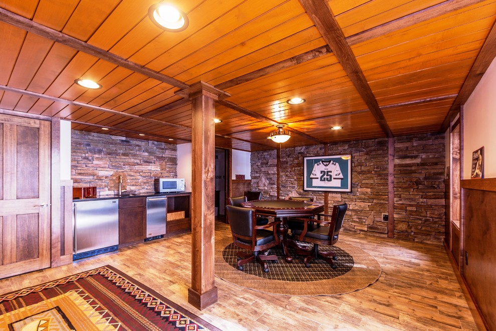 Photo of a large rustic look-out basement in Other with beige walls, medium hardwood flooring and no fireplace.