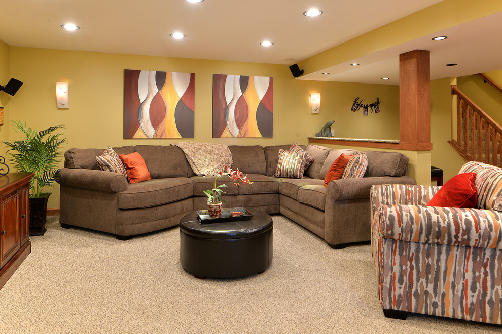 Photo of a medium sized traditional fully buried basement in Atlanta with yellow walls and carpet.