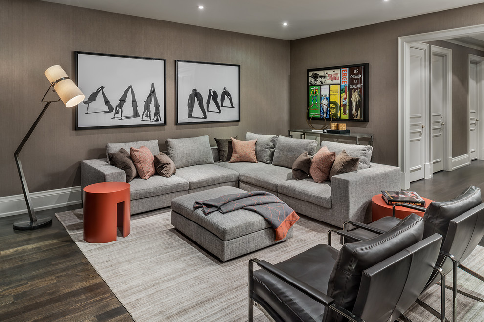 Large classic living room in Toronto with dark hardwood flooring, brown floors and grey walls.