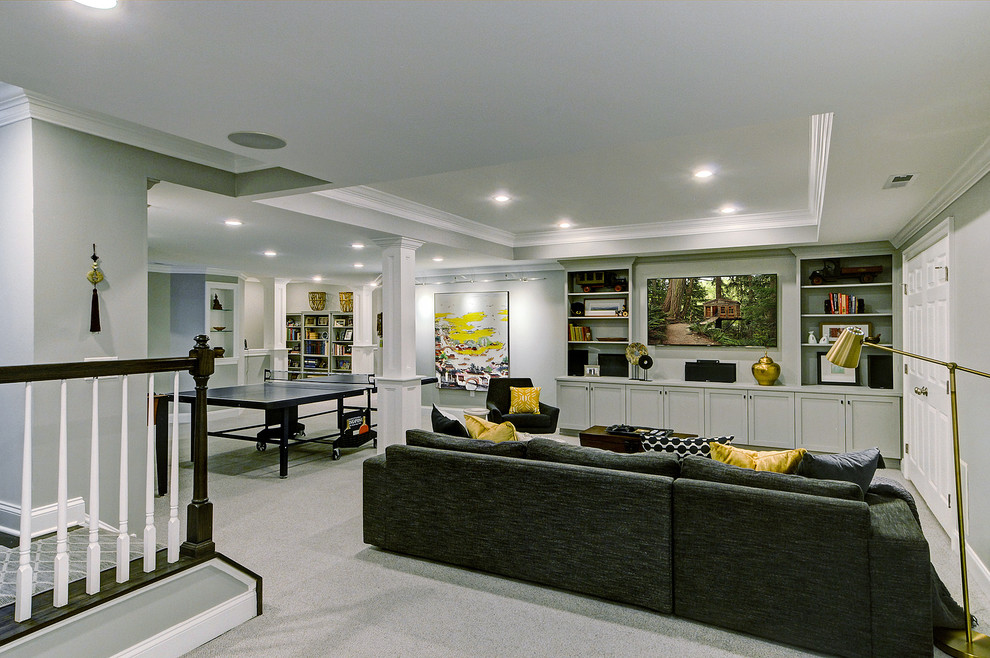 Large transitional walk-out carpeted basement photo in Philadelphia with gray walls
