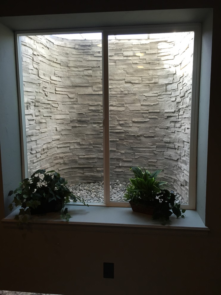 Basement window well Traditional Basement Denver by Castle