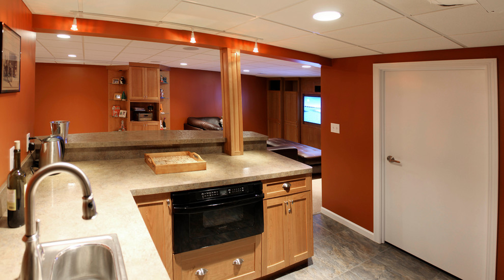 Example of a mid-sized minimalist carpeted kitchen design in Cleveland