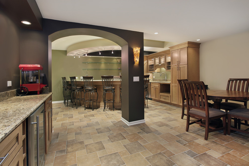 This is an example of a contemporary basement in DC Metro with beige walls and medium hardwood flooring.