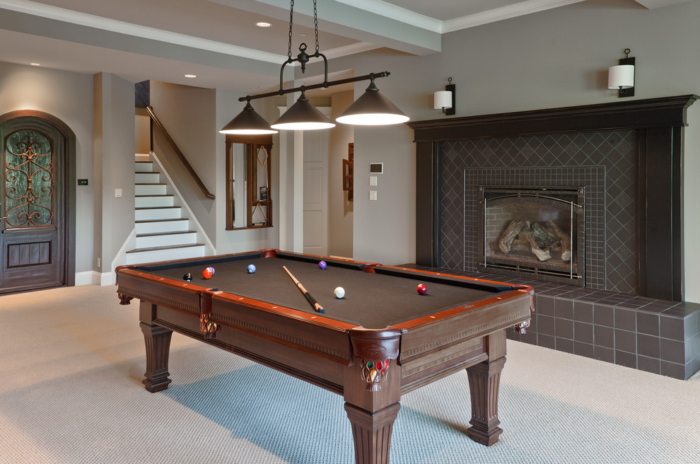 Design ideas for a classic games room in Seattle with grey walls, carpet, a standard fireplace, a tiled fireplace surround and beige floors.