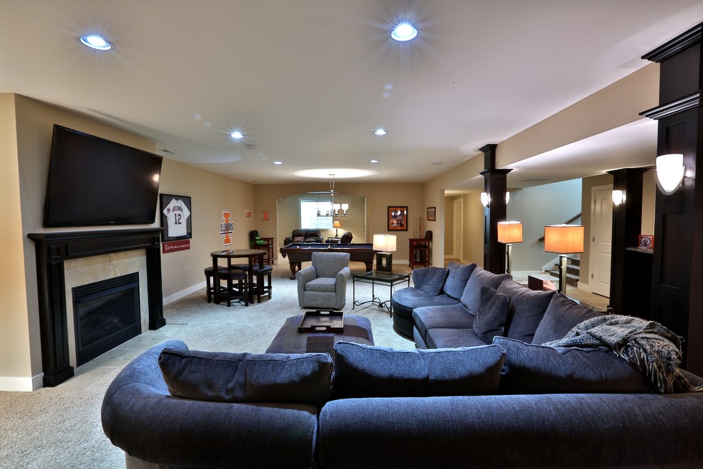 Example of a large classic look-out carpeted basement design in Chicago with beige walls, a standard fireplace and a tile fireplace