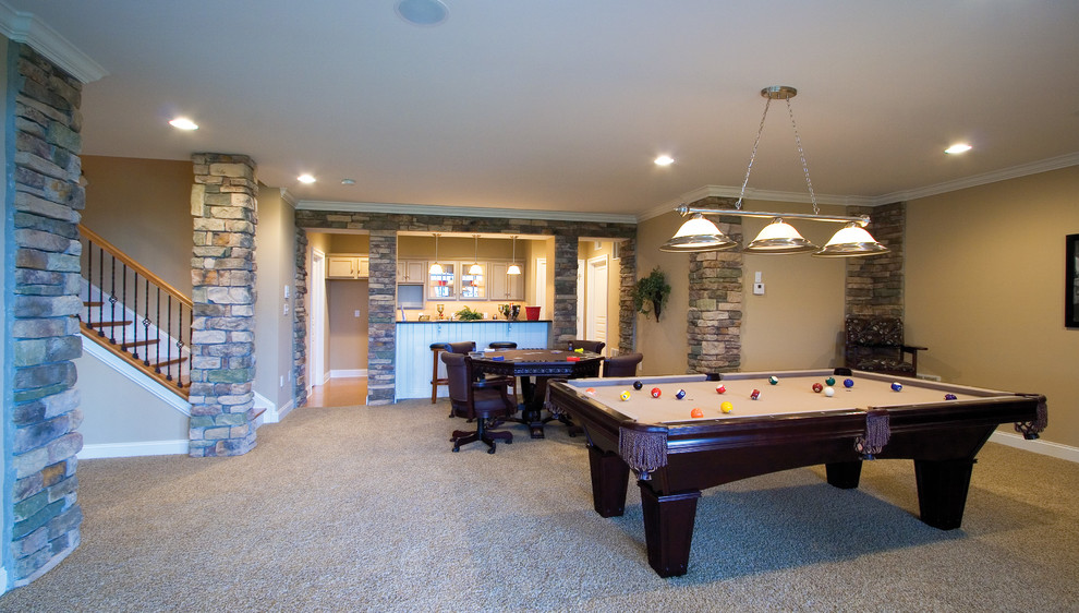 Expansive classic walk-out basement in Other with beige walls and carpet.