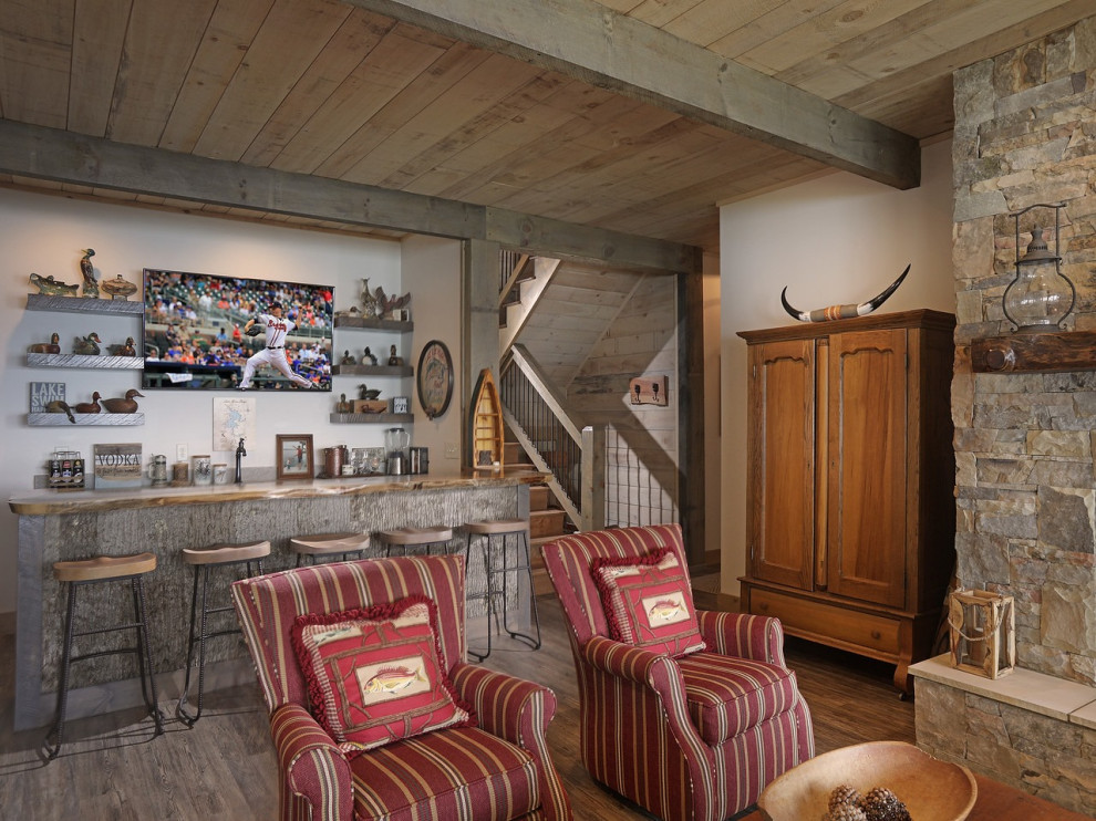 Стильный дизайн: гостиная комната в стиле рустика с домашним баром - последний тренд