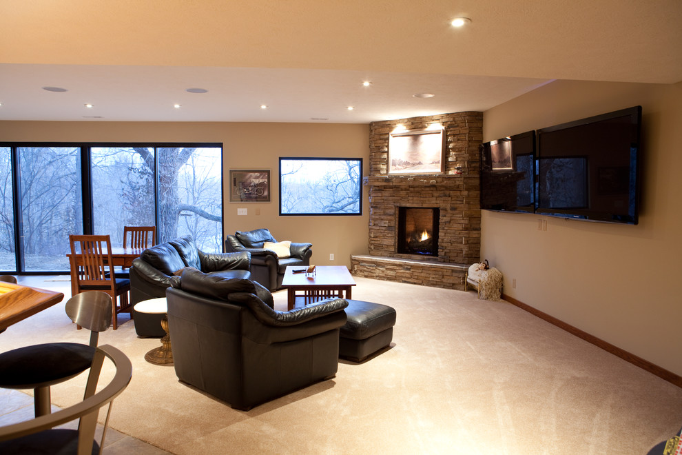 Design ideas for a traditional basement in Omaha with a corner fireplace.