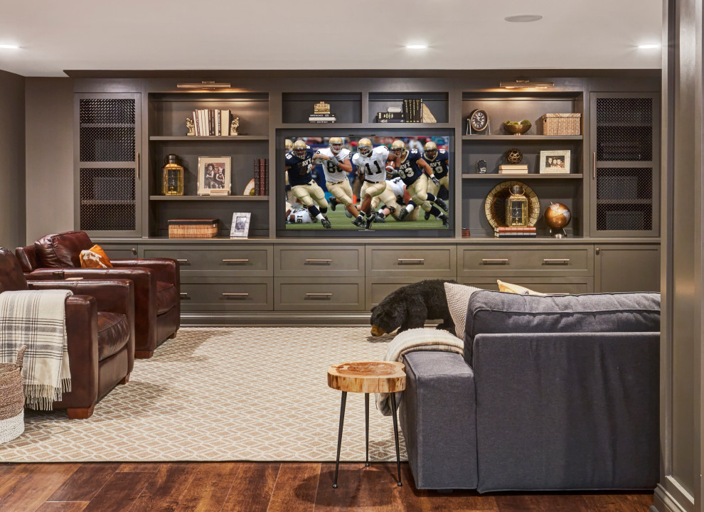 Example of a transitional dark wood floor and brown floor basement design in Chicago with gray walls