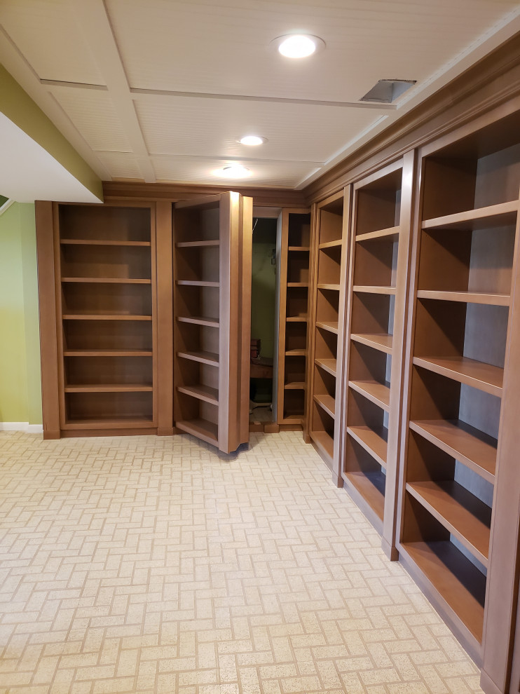 Bookcasehidden bookcase doors Traditional Basement Detroit by