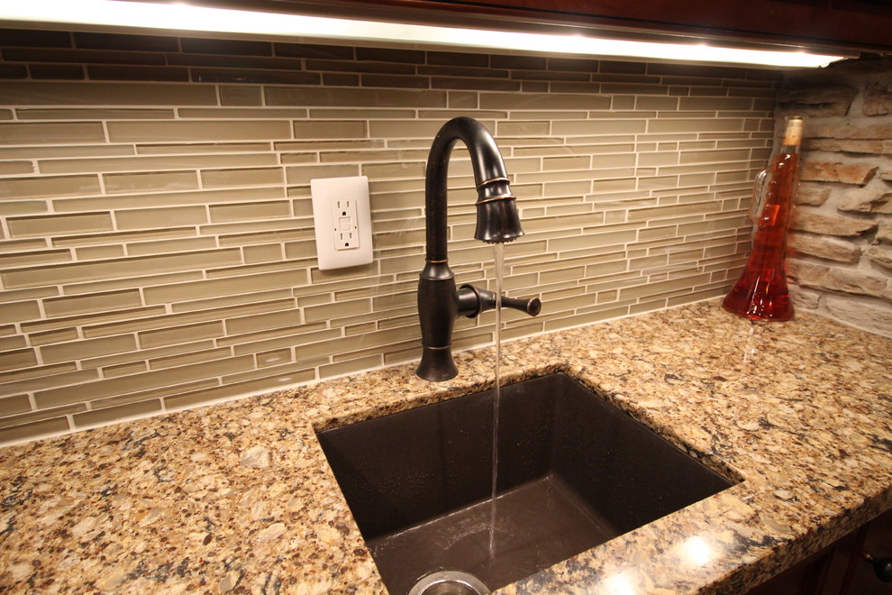 Brizo oil rubbed bronze faucet and Blanco silgranit sink in cafe